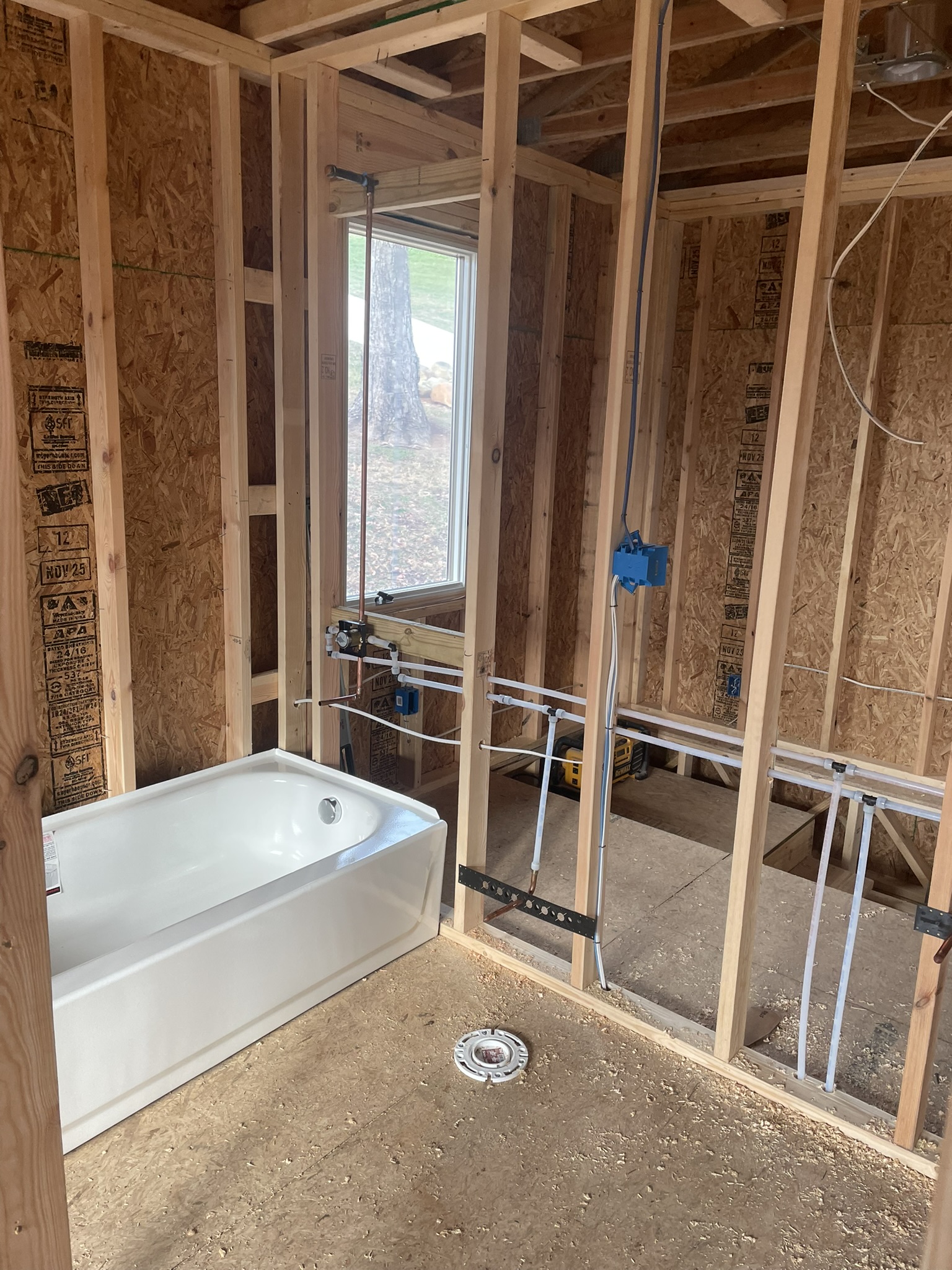 Residential plumbing rough-in during construction